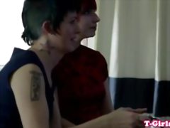 Inked transgirl straponfucked by redhead babe