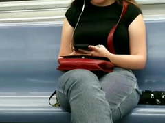 Cute Nerdy girl with glasses on the train. Hippie girl feet